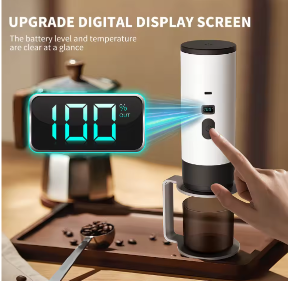 Digital coffee maker with digital display screen on a wooden table.